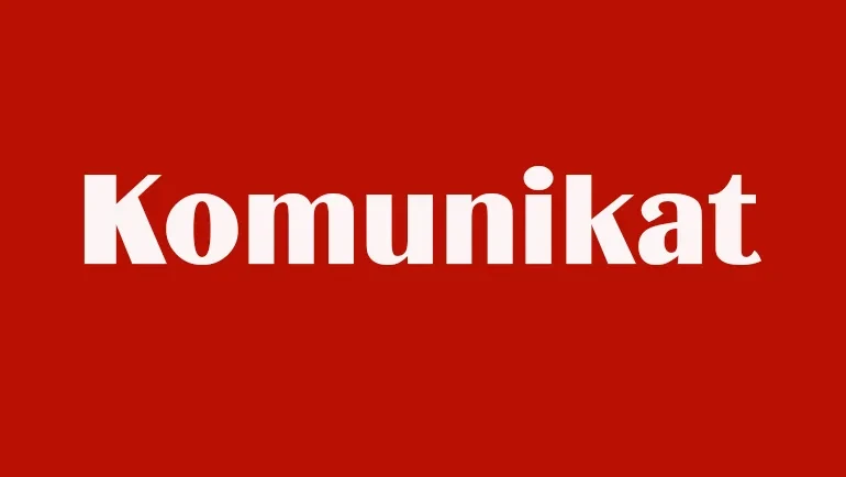 napis komunikat na czerwonym tle