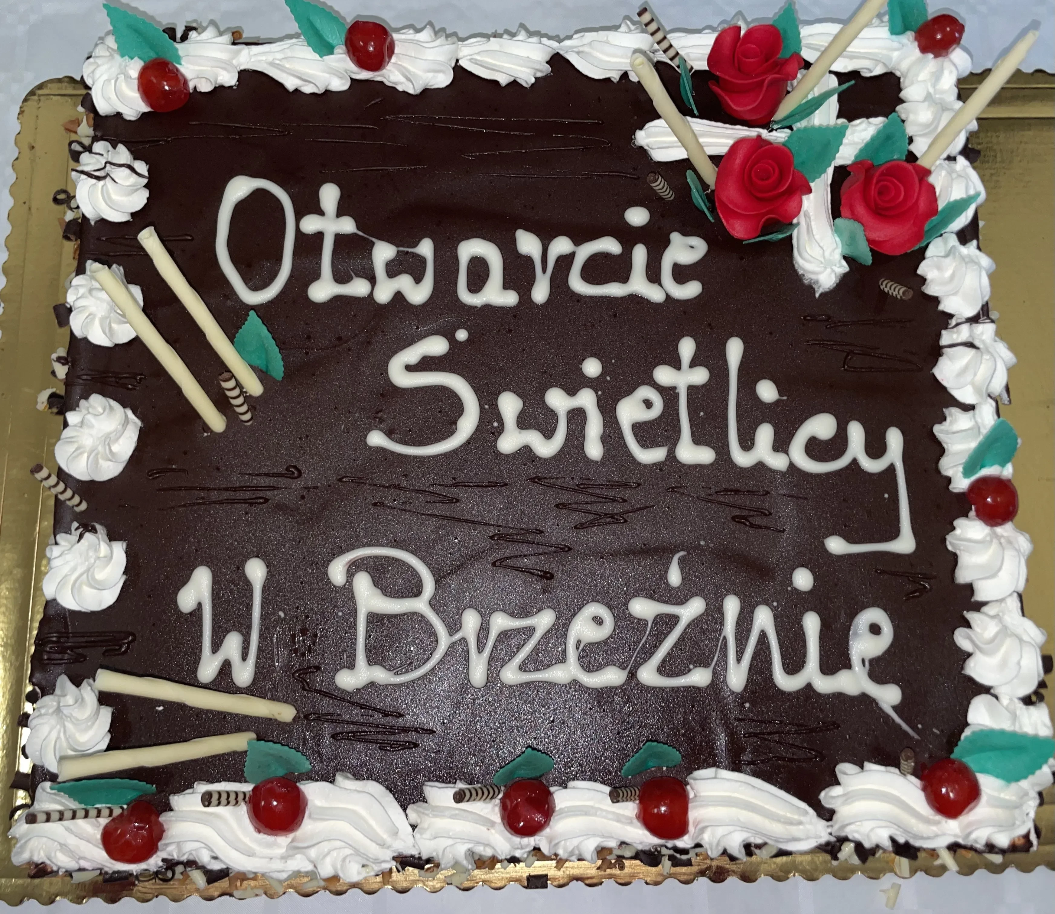 ciasto z napisem "otwarcie świetlicy w brzeźnie"